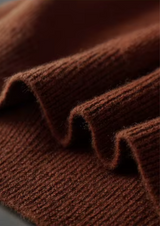 PURE EXTRA-FINE MERINO WOOL RIBBED BUTTONLESS POLO